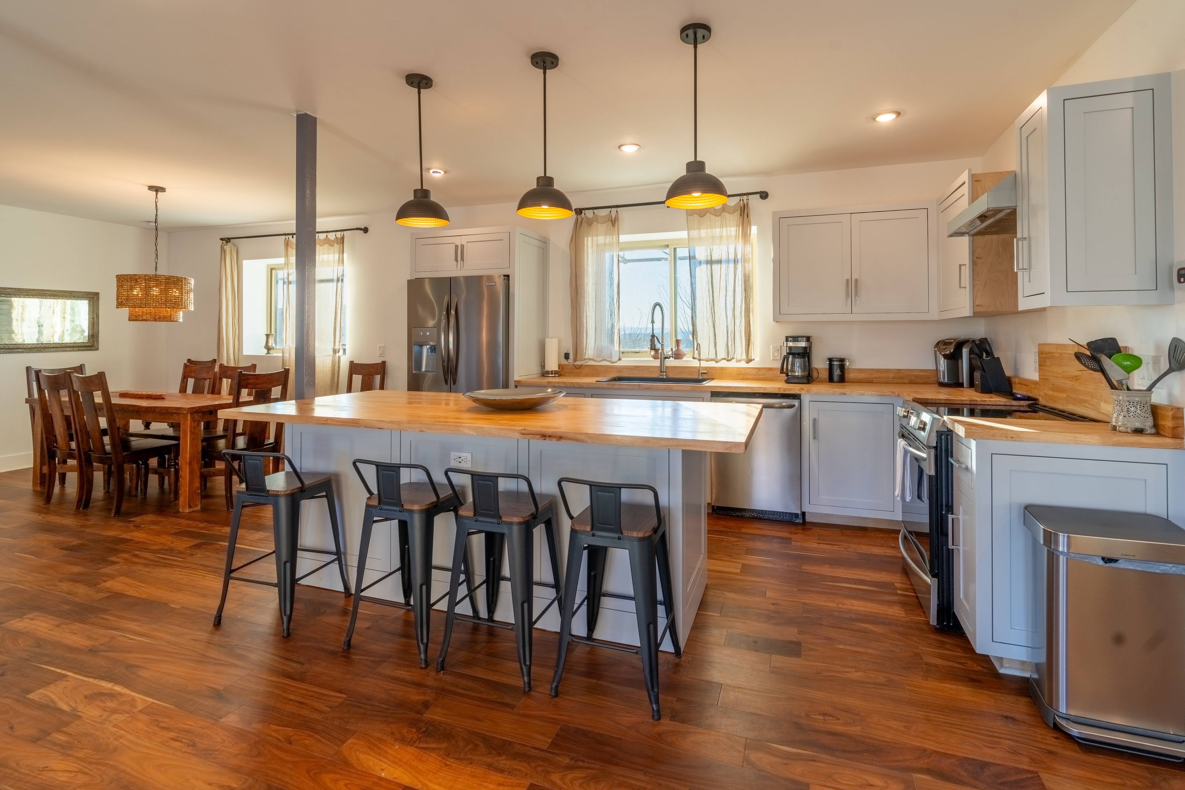 Modern kitchen with island seating and pendant lights