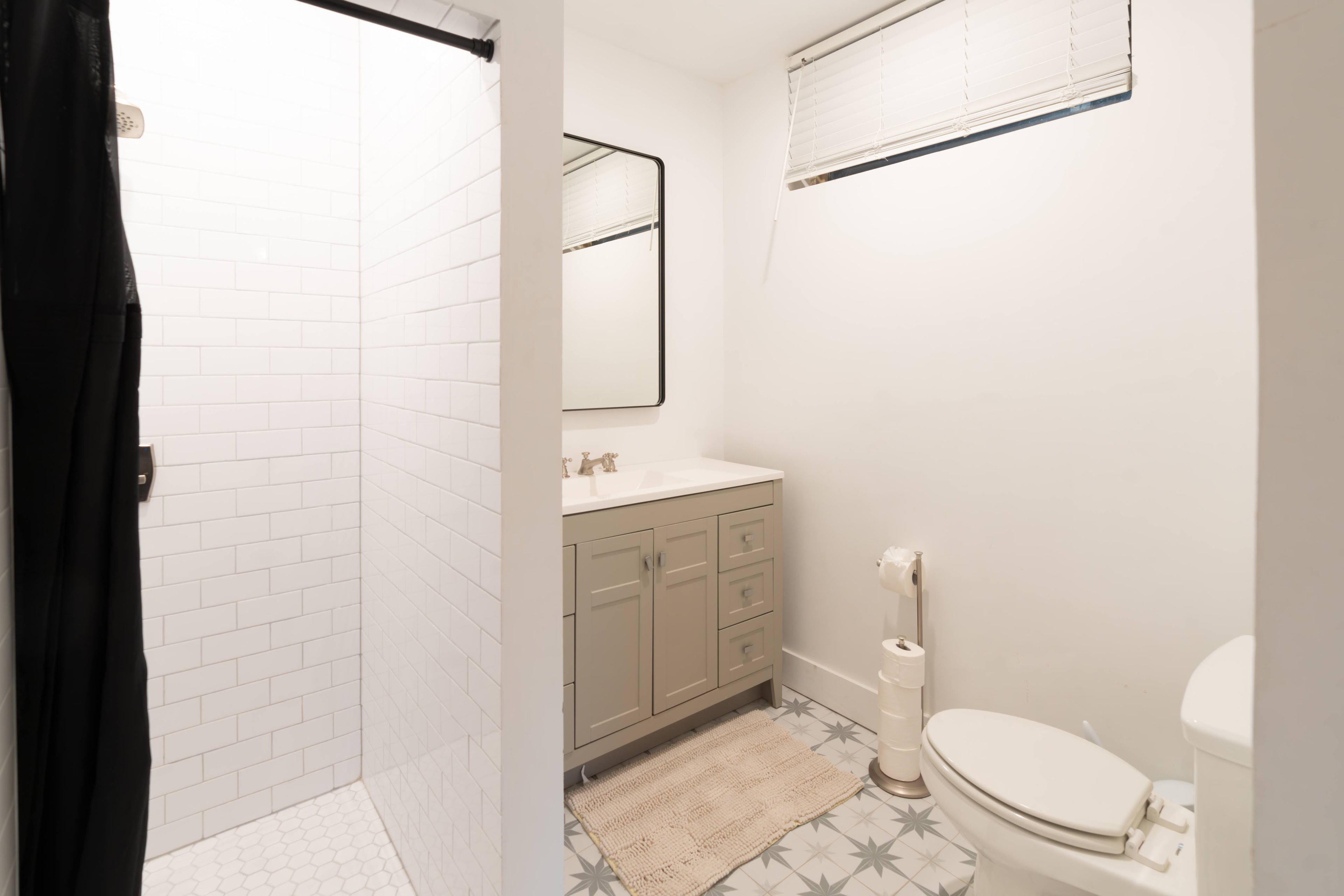 Modern bathroom with subway tile shower