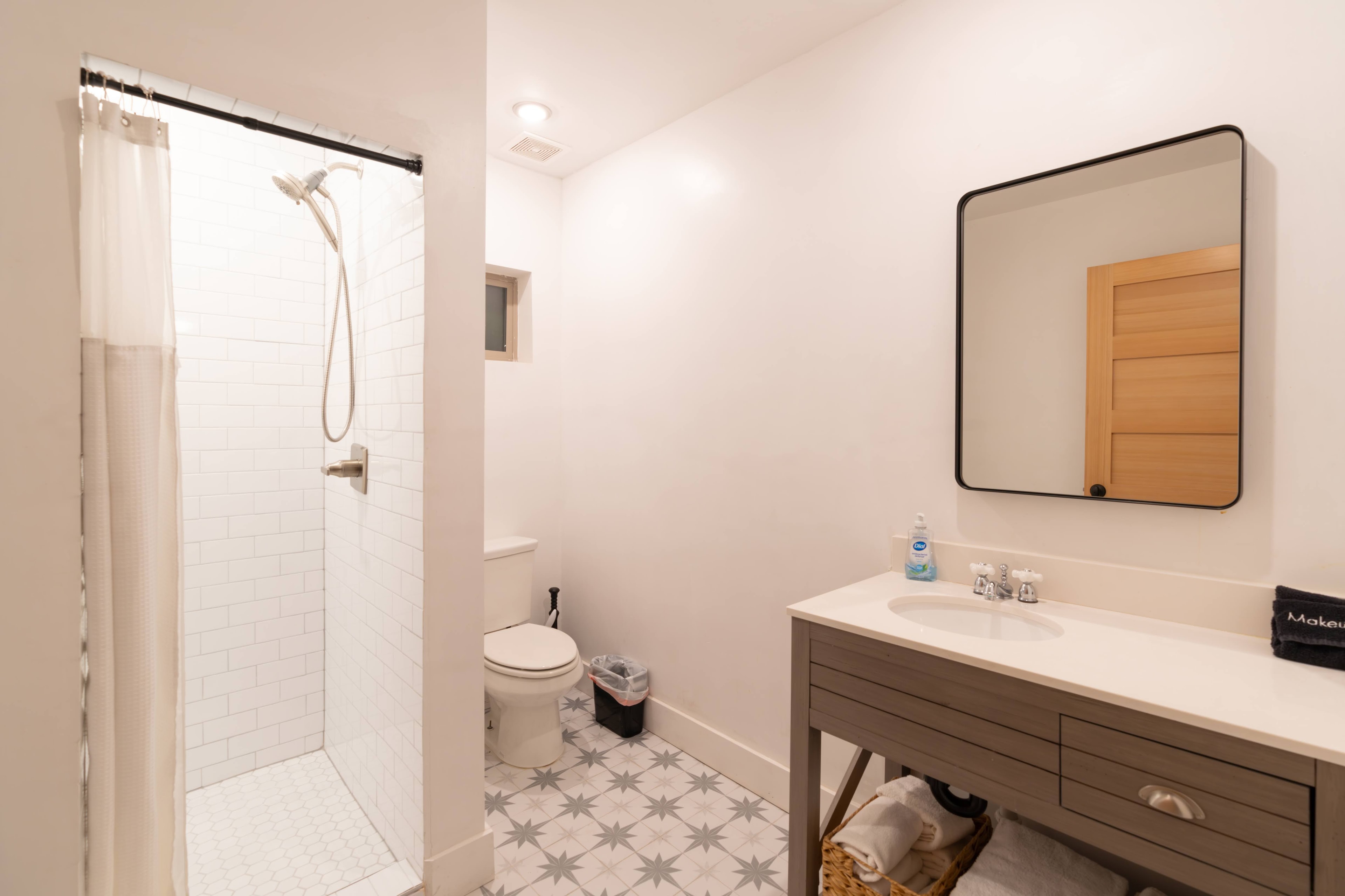 Modern bathroom with shower and vanity